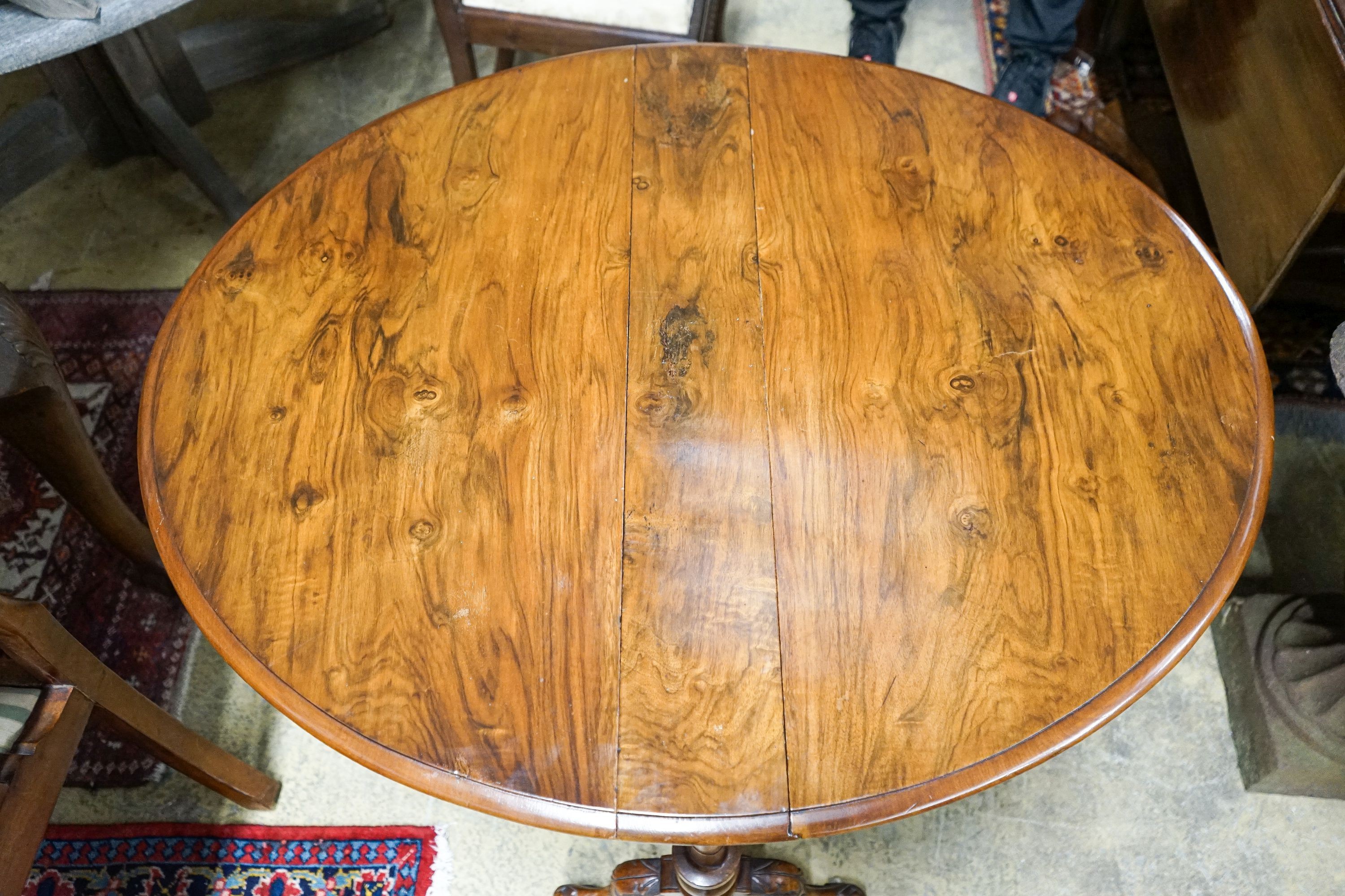 A Victorian walnut Sutherland table, width 90cm, height 71cm